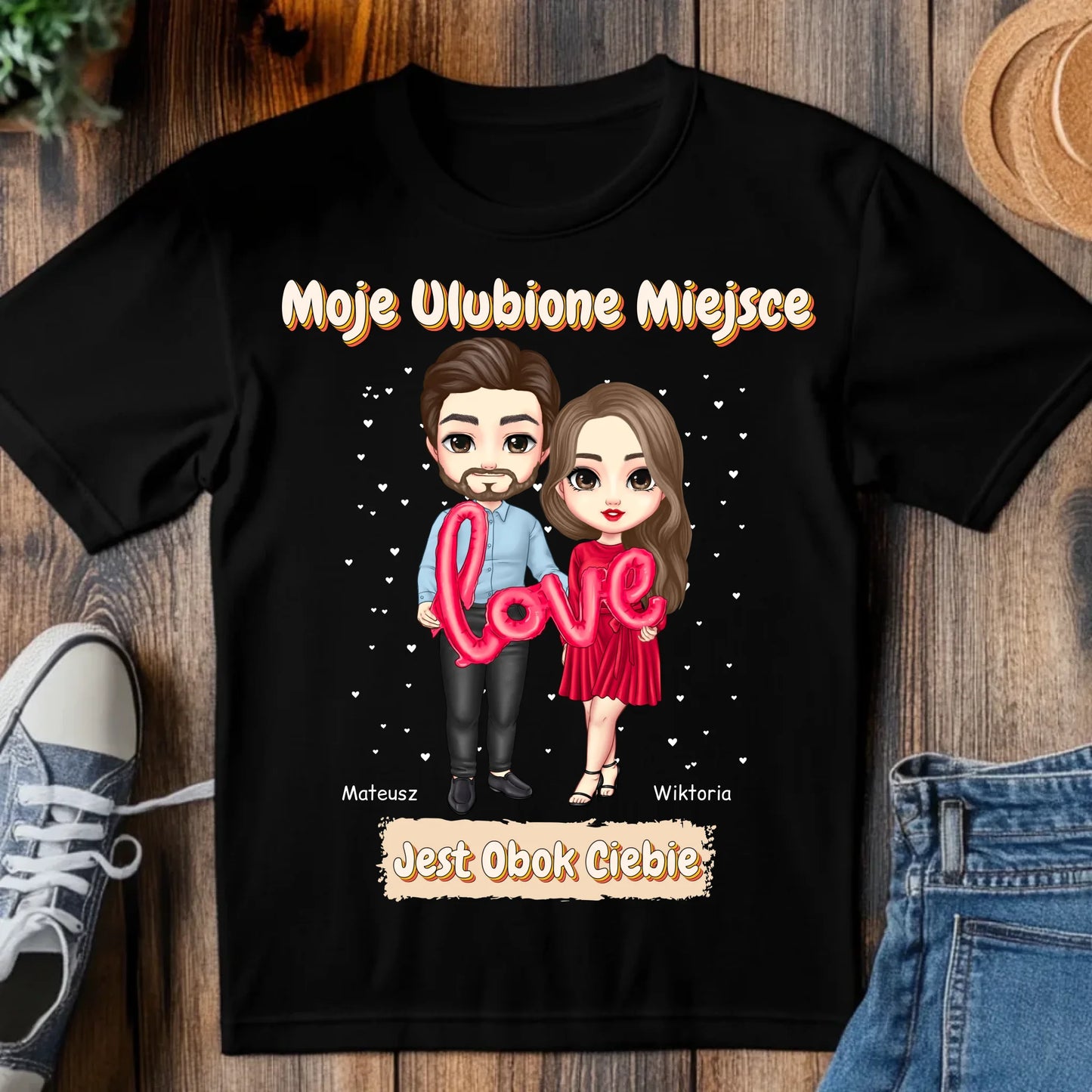 tj_tam_a_black_t-shirt_mockup_on_a_wood_table_with_a_pair_of_sn_6b5f746f-675d-4c35-ad43-c9b394cca209