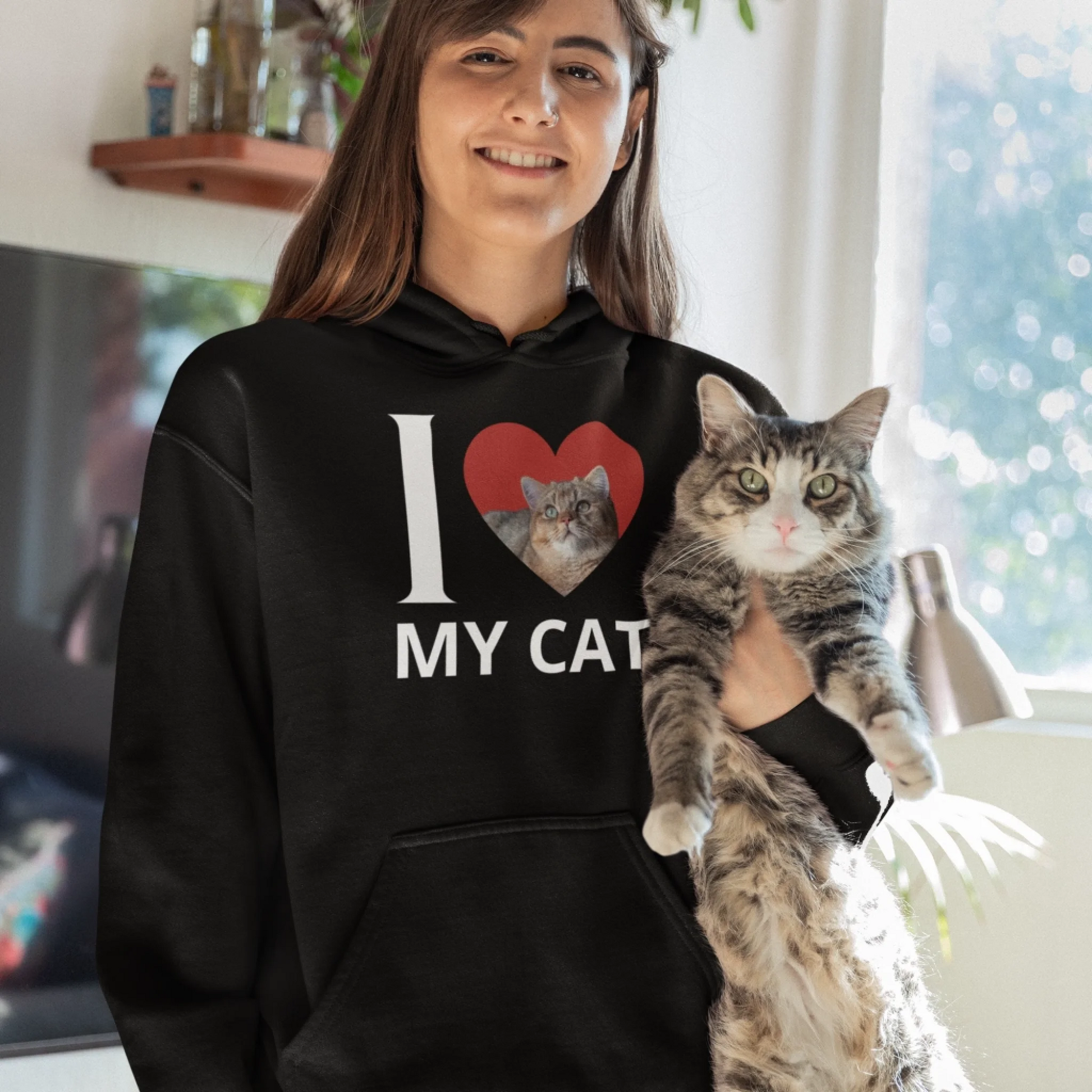 gildan-pullover-hoodie-mockup-of-a-woman-posing-with-her-cat-at-home-m34777