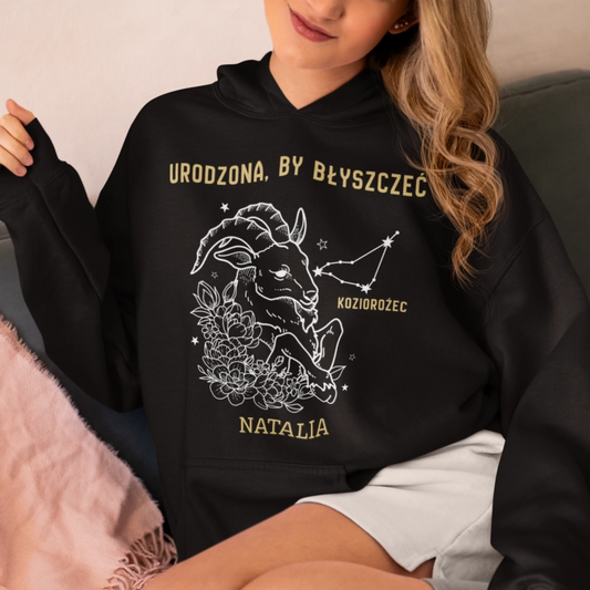 gildan-hoodie-mockup-featuring-a-woman-sitting-on-a-cozy-sofa-m37284