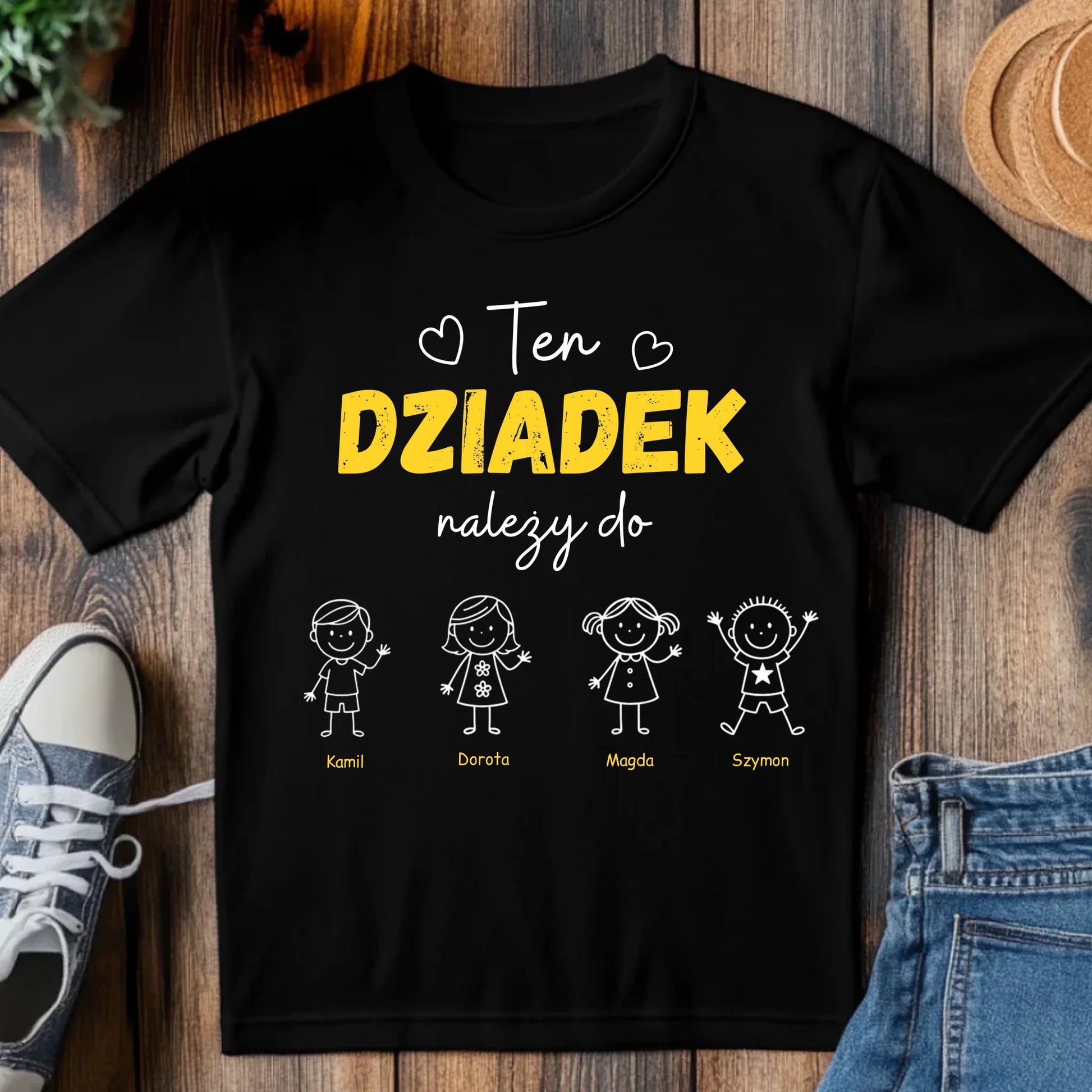 tj_tam_a_black_t-shirt_mockup_on_a_wood_table_with_a_pair_of_sn_6b5f746f-675d-4c35-ad43-c9b394cca209