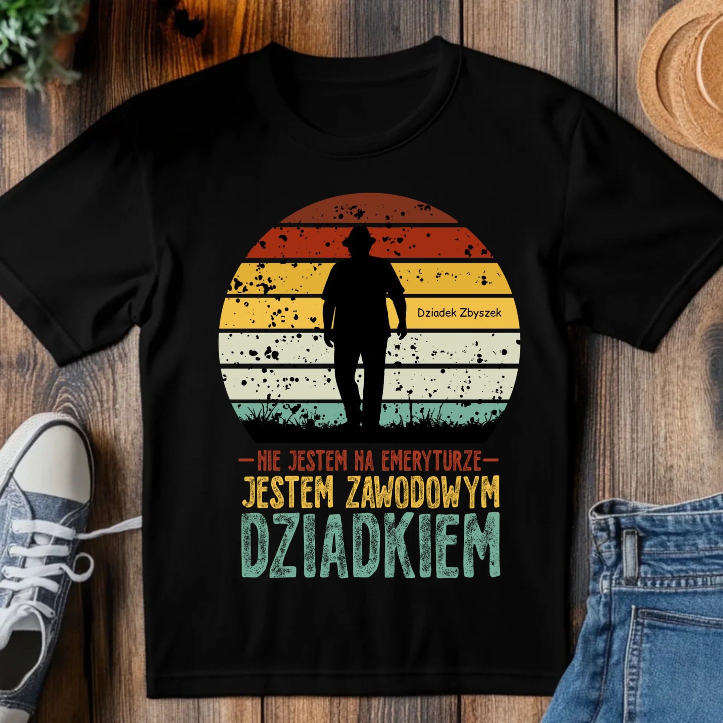 tj_tam_a_black_t-shirt_mockup_on_a_wood_table_with_a_pair_of_sn_6b5f746f-675d-4c35-ad43-c9b394cca209